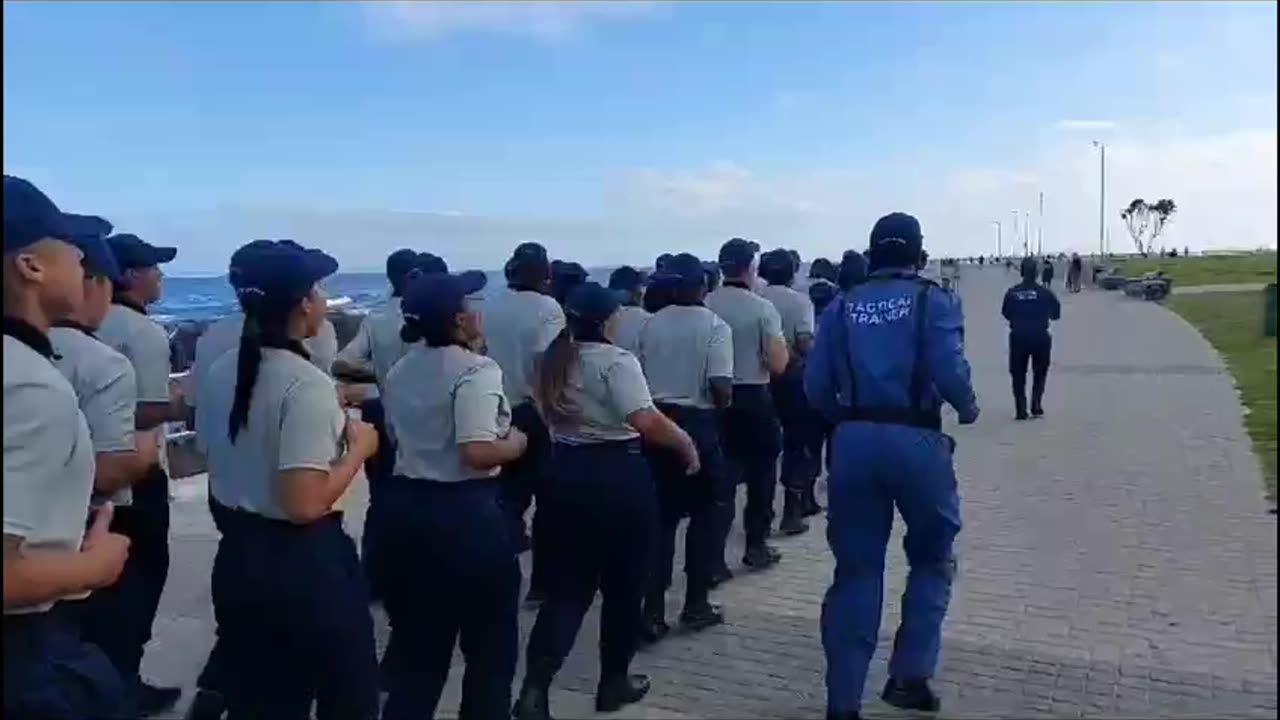 77 Metro Police cadets in rhythmic drill at Sea Point Promenade