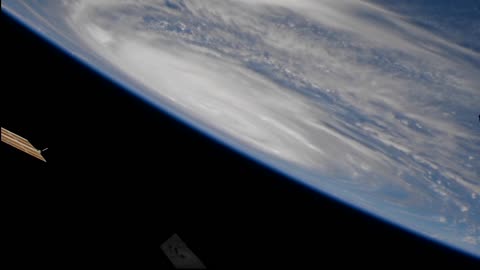 Space Station Flies Over Hurricane