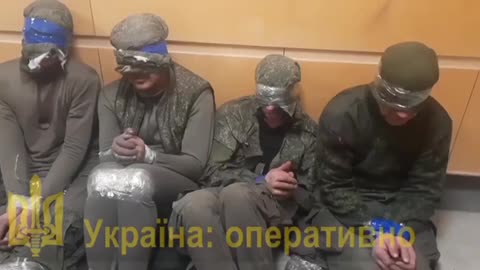 Captured Russian soldiers forced to sing the Ukrainian national anthem.