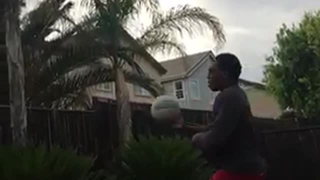 Basketball layup into kids hoop