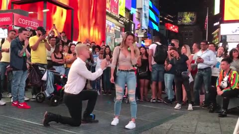 Men, kneeling down to propose to a woman, especially in public