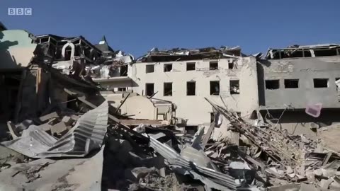 apartment block hit by shelling