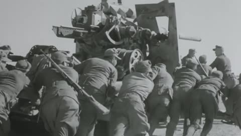 8.8cm Flak 18s engaging ground targets in North Africa in 1941