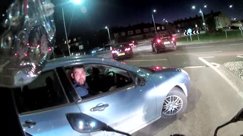 Raged Driver Tries to Fight Biker