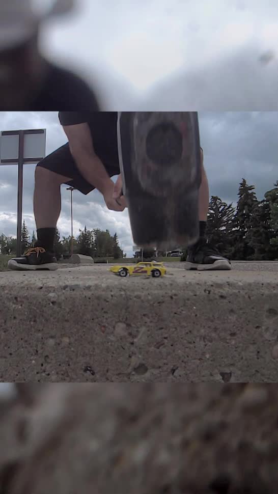 Man Breaks Toy Car And Concrete Stairs With Sledgehammer At The Same Time