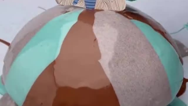 The cake does this for the baby, on this beautiful afternoon.