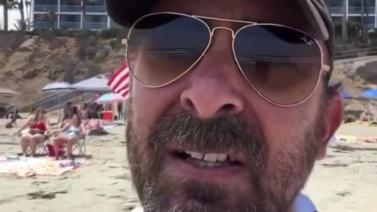 Pathetic Liberal Throws Fit After Seeing American Flags On Beach