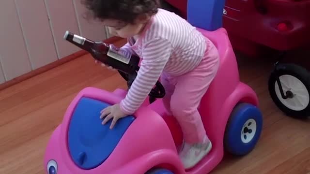 Baby Girl Steals Dad's Beer and Goes on Joyride