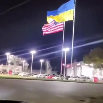 Would you buy a car from this dealership proudly displaying the Ukraine flag? 😑