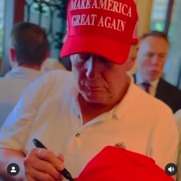 President Trump Signing a hat at Mar-A-Lago