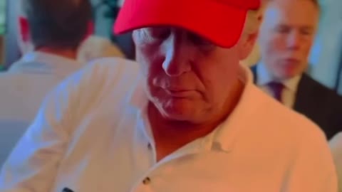 President Trump Signing a hat at Mar-A-Lago