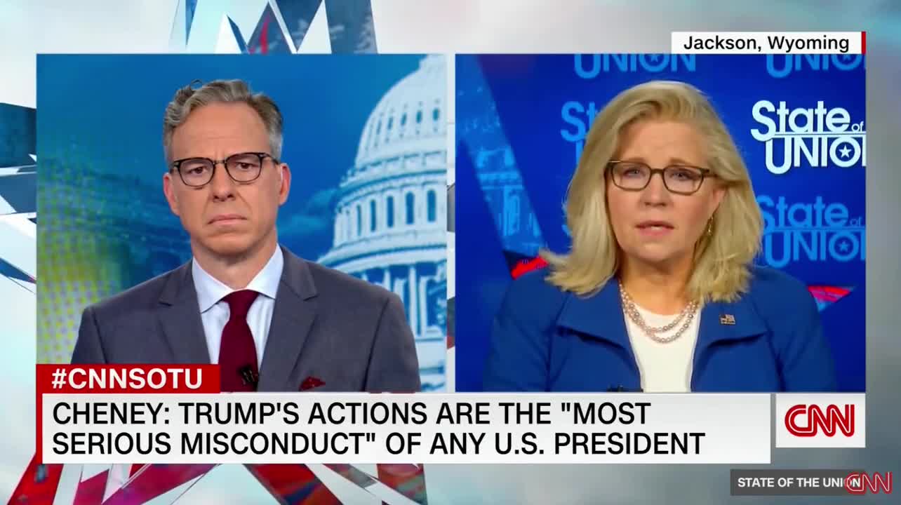 Jake Tapper and Liz Cheney have their serious somber faces on - 7/24/22
