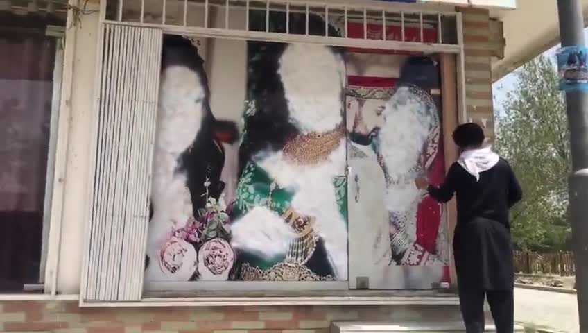 Taliban Spray Painting Women Faces Kabul