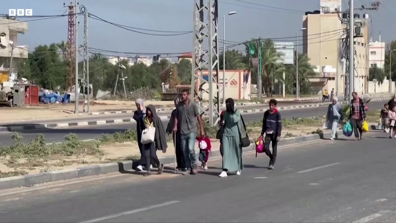 Israel-Gaza war- Civilians leave northern Gaza along evacuation corridor