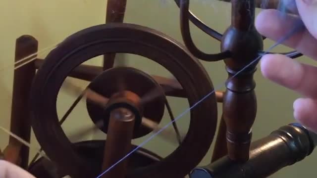 First Spin with Chair Wheel and Distaff