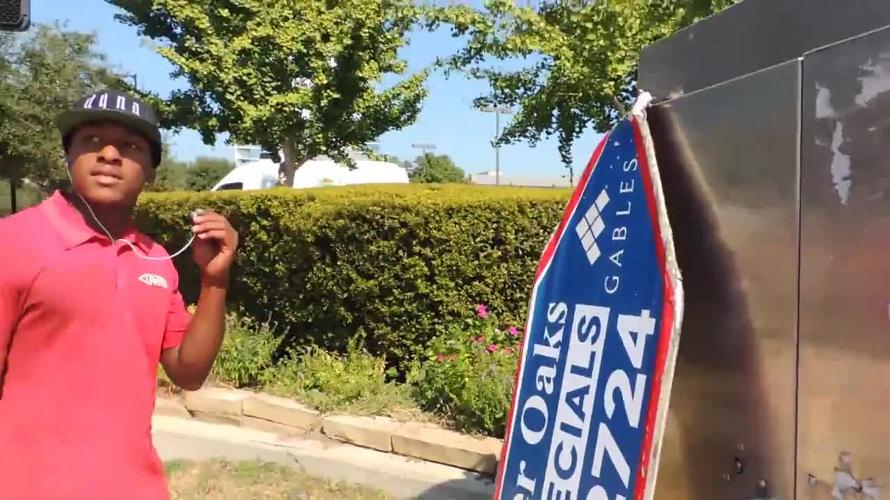 Sign Spinner Shows Incredible Skills And Takes Advertising To The Next Level