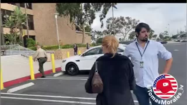 Antifa member Chad Loder leaves court in a Mercedes with a police escort