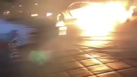 car catches fire doing maneuver