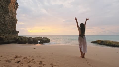 Woman feeling freedom at the beach