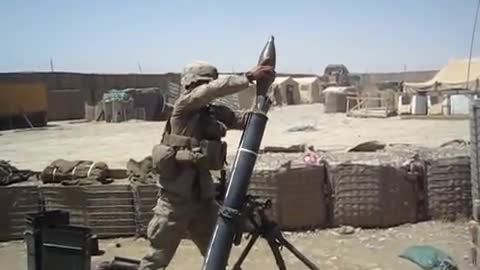 Marine Mortar man Firing moment