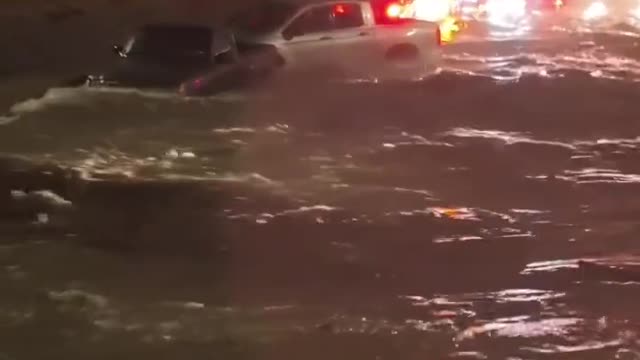 Flooding in Dallas, Texas, strands cars,