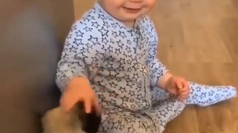 Adorable puppy enjoy playing with cute small human 💕 💖 💓