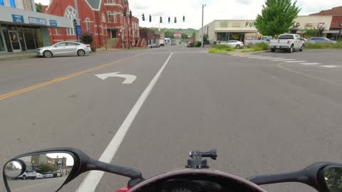 MOTORCYCLE RIDE IN SMALL TOWN PULASKI.