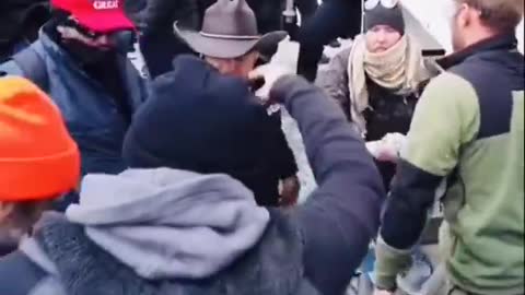 Capitol "Rioters" Passing Weapons to Cops