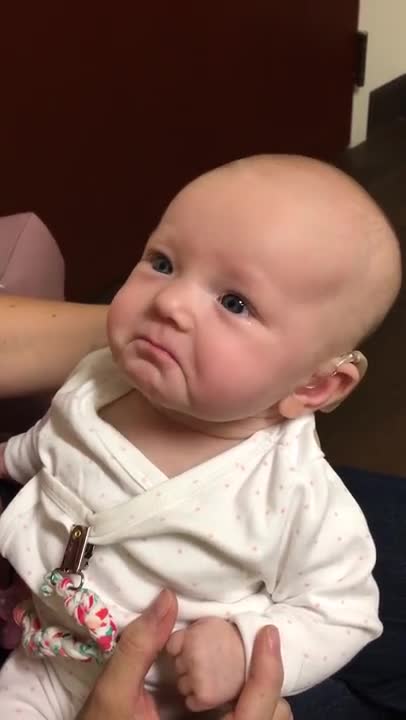 My baby hears me for the first time and is almost moved to tears!