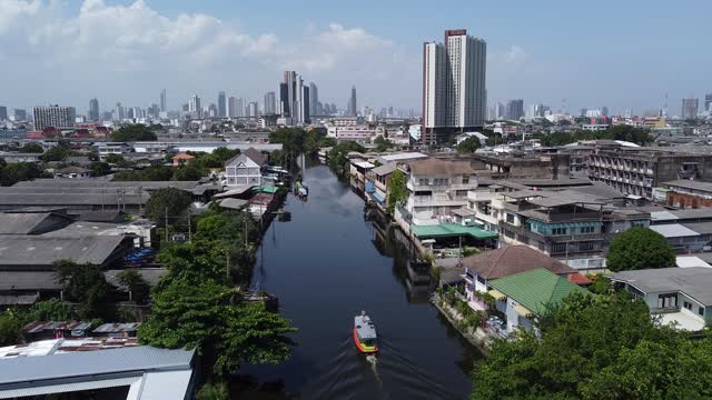 A Single Ferry Boat with a Drone Pilot on the Roof of the Boat in Thailand - Adventure ahead!