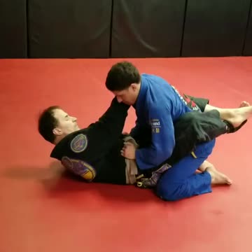 Omaplata to backstake to lapel choke