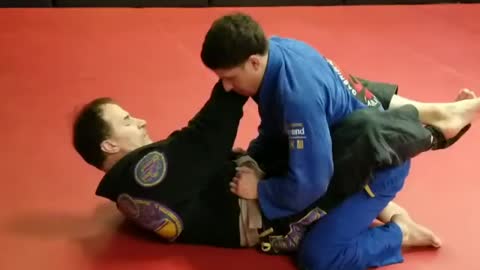 Omaplata to backstake to lapel choke