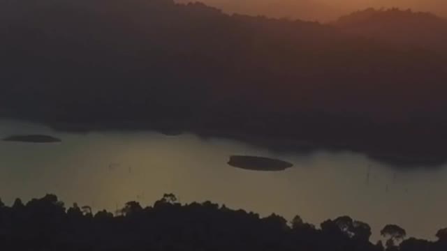 View from the air of a lake during a sunset