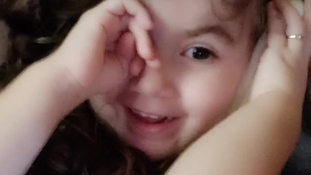 my princess thinking the controller is a cell phone