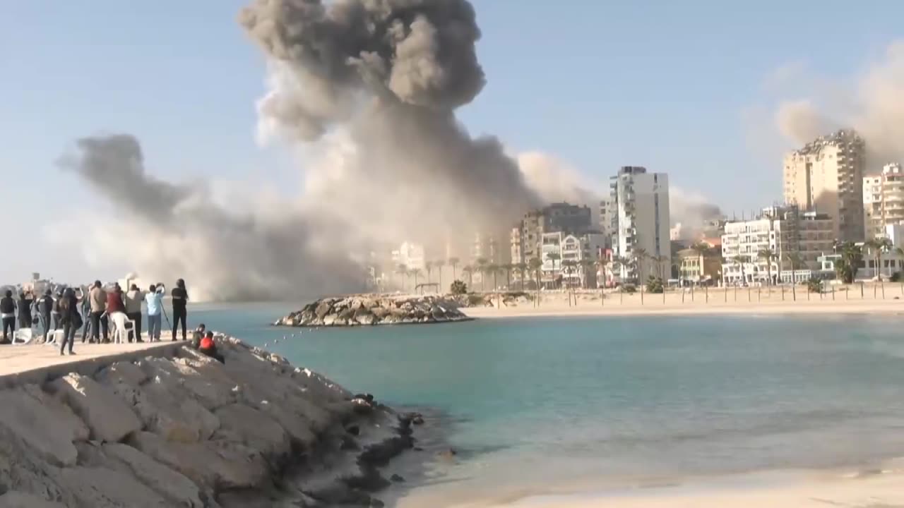 The moment Israeli airstrikes raze residential buildings to the ground