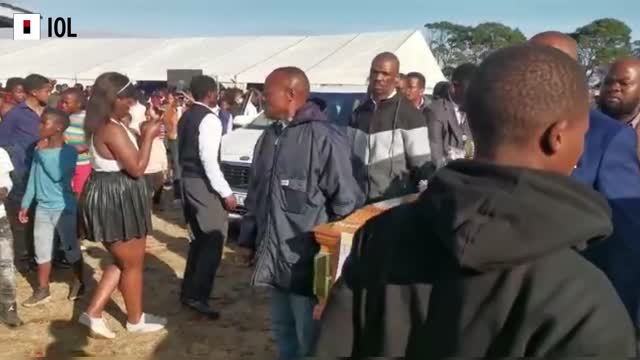 Funeral: Coffins being moved