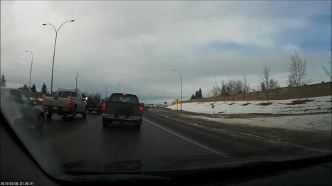 Impatient driver almost loses control trying to get ahead of traffic