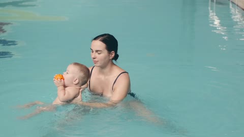 BABY IN THE WATER