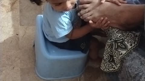 My baby doing exercise of her grandmother