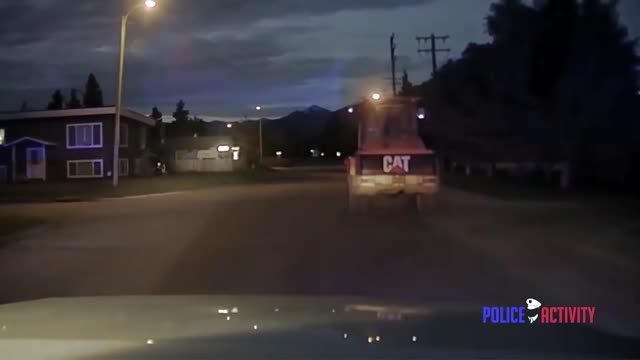 Dashcam Shows Slow Speed Police Chase Of Stolen Front Loader