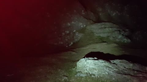 Setting up the lighting and positioning the camera for a night vlog at Saddle Tor Dartmoor