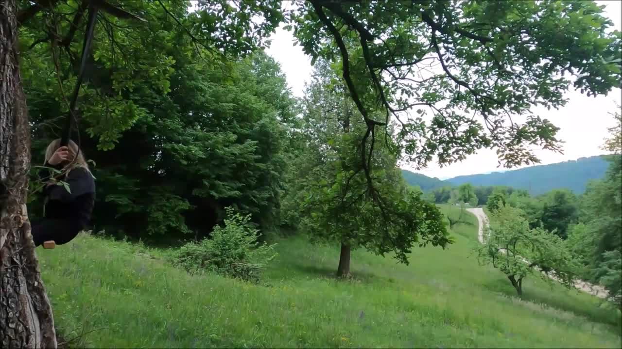 Cute baby and doggy running competition in the green field