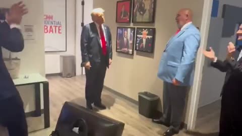President Trump emerges from the stage victorious.
