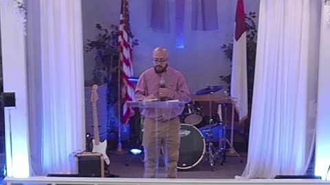 Pastor Julio preaching the Word