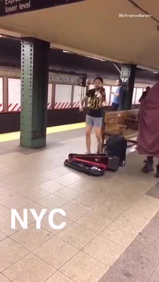Nyc violin player man shuffles past