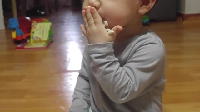 What does the baby eat while laughing?