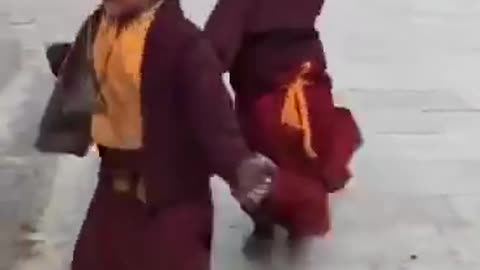 Dancing little monk