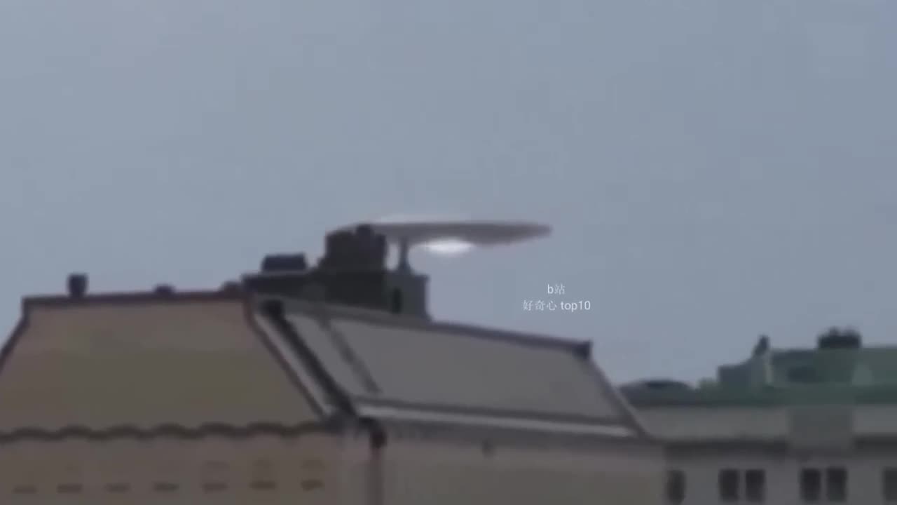 001 - UFO captured above unknown city