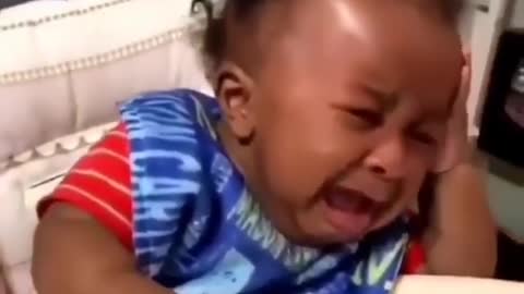 Baby's reaction to Daddy's new haircut