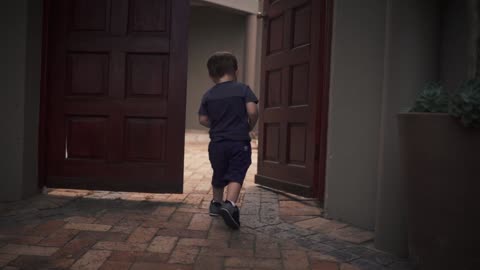 The boy is running